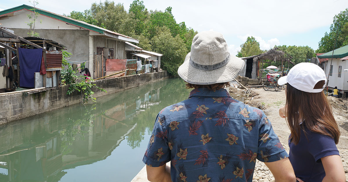 Houses next to flood channel